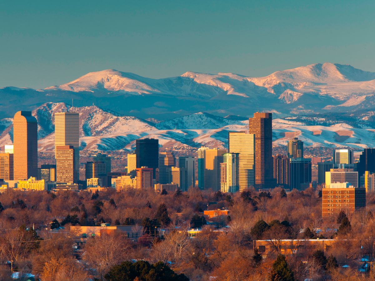 Downtown Denver and the snow-covered Rocky Mountains