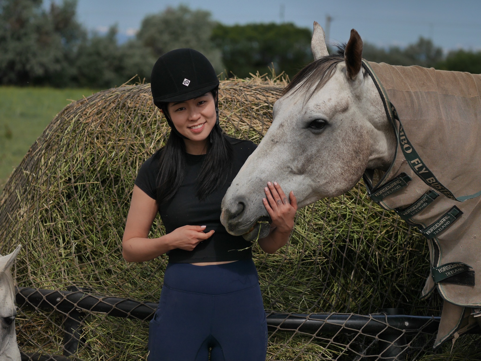 Wenxin Ye with a horse